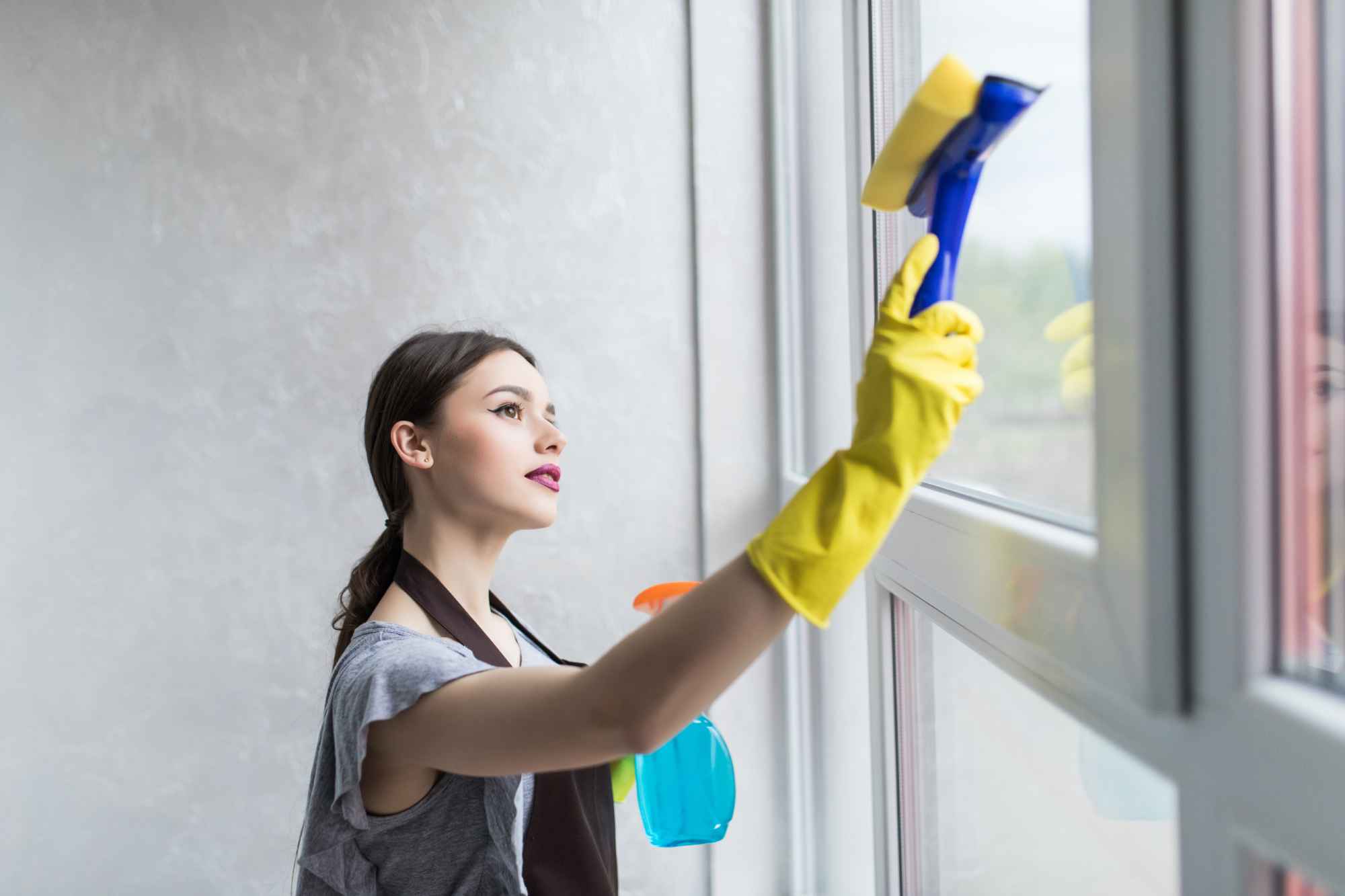 Window cleaning in a Brisbane home